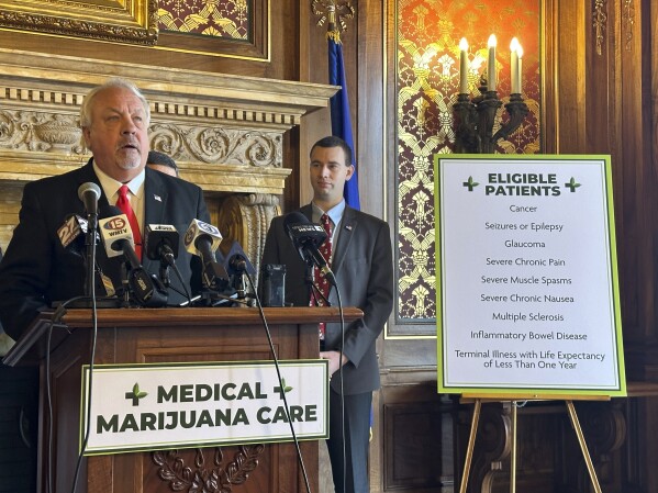 Republican Rep. Jon Plumer unveils a GOP proposal to legalize medical marijuana in Wisconsin at a Capitol news conference on Monday, Jan. 8, 2024, in Madison, Wis. (AP Photo/Scott Bauer)