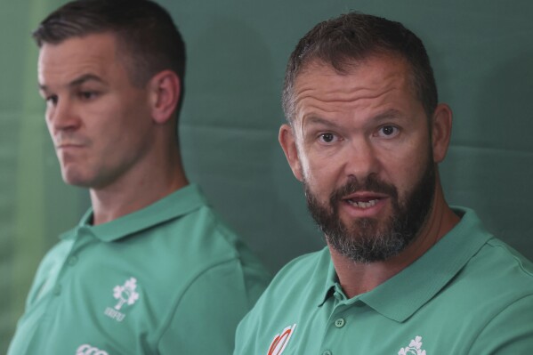Ireland's Head Coach Andy Farrell, right, and Jonathan Sexton during the Ireland Rugby World Cup 2023 squad announcement at the Shelbourne Hotel in Dublin, Ireland, Sunday Aug. 27, 2023. (Damien Eagers/PA via AP)