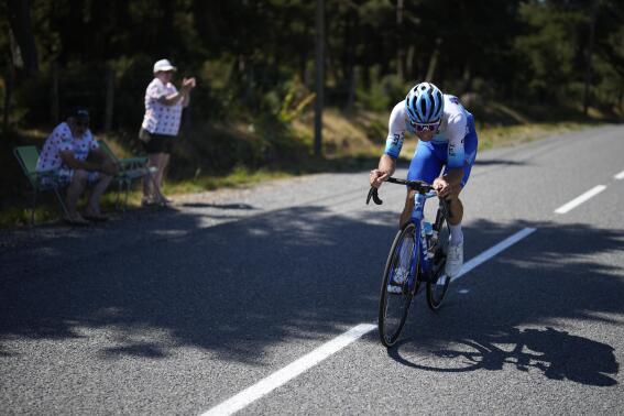 Stage winner Australia's Michael Matthews rides breakaway during the fourteenth stage of the Tour de France cycling race over 192.5 kilometers (119.6 miles) with start in Saint-Etienne and finish in Mende, France, Saturday, July 16, 2022. (AP Photo/Daniel Cole)
