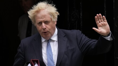 FILE - British Prime Minister Boris Johnson leaves 10 Downing Street to attend the weekly Prime Minister's Questions at the Houses of Parliament, in London, on May 25, 2022. Britain’s House of Commons is likely to endorse a report that found Johnson lied to lawmakers about lockdown-flouting parties in his office. That would be a humiliating censure that would strip the former prime minister of his lifetime access to Parliament. Lawmakers on Monday, June 19, 2023 will debate a report by the Privileges Committee that found Johnson in contempt of Parliament, and are expected to approve its findings. (AP Photo/Matt Dunham, File)