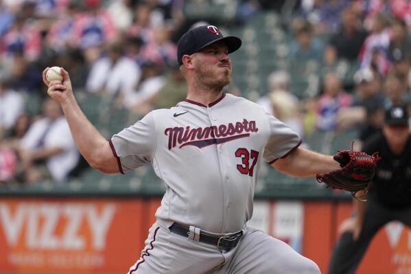 Minnesota Twins starting pitcher Dylan Bundy throws against the Chicago White Sox during the first inning of a baseball game in Chicago, Sunday, Sept. 4, 2022. (AP Photo/Nam Y. Huh)