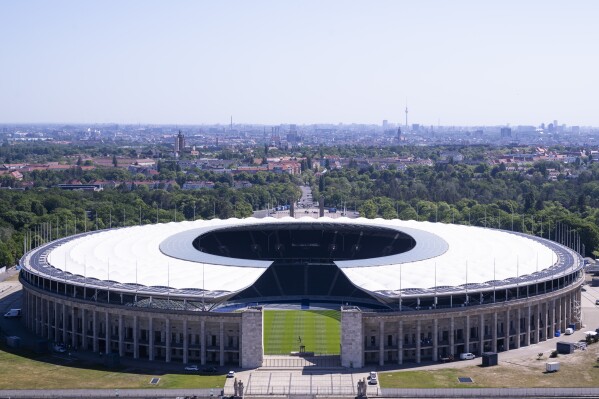 FILE - The Olympic Stadium photographed in Berlin, Germany, Tuesday, May 14, 2024. The stadium will host the final and 5 other matches during European Soccer Championships 2024 in Germany. The European Championship in Germany is all about tried and tested stadiums with a rich soccer history. Unlike at some recent World Cups, there's been no rush to finish stadiums on time. (AP Photo/Markus Schreiber, File)