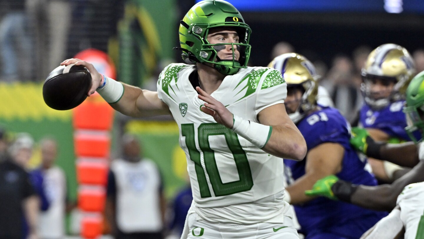 Oregon quarterback Bo Nix dejected after loss in Pac-12 championship, mum on status for bowl game