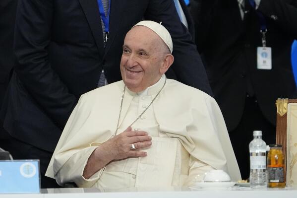 Pope Francis smiles before delivering a final declaration of the '7th Congress of Leaders of World and Traditional Religions, at the Palace of Peace and Reconciliation, in Nur-Sultan, Kazakhstan, Thursday, Sept.15, 2022. Pope Francis is on the third day of his three-day trip to Kazakhstan. (AP Photo/Alexander Zemlianichenko)