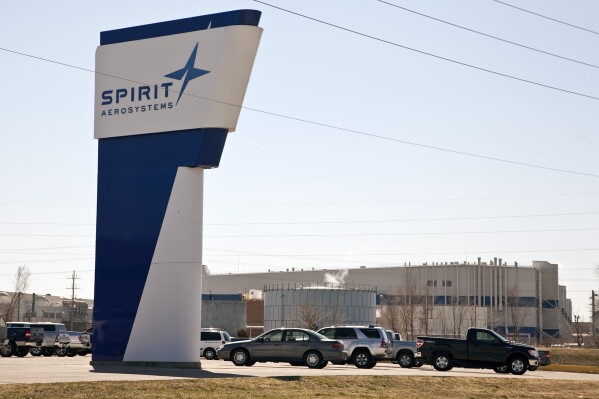 FILE - This Thursday, July 25, 2013, photo shows Spirit AeroSystems in Wichita, Ks. Airline supplier Spirit Aerosystems says it's aware of a quality issue involving elongated fastener holes on the aft pressure bulkhead on certain models of the 737 fuselage it produces. Shares of Spirit Aerosystems Holdings Inc. dropped more than 6% before the market open on Thursday, Aug. 24, 2023, while Arlington, Virginia-based Boeing Co.'s stock slipped nearly 2%. (Mike Hutmacher/The Wichita Eagle via AP, File)