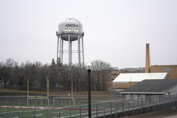 A water tower is pictured Saturday, Feb. 3, 2024, in Anoka, Minn. Hundreds of U.S. communities have enacted “crime-free” laws that encourage and allow landlords to evict tenants after repeated calls to police or for emergency services. Proponents say the laws help reduce crime, but the U.S. Department of Justice last year found that the Minneapolis suburb used its ordinance to illegally discriminate against people with mental illnesses(AP Photo/Abbie Parr)