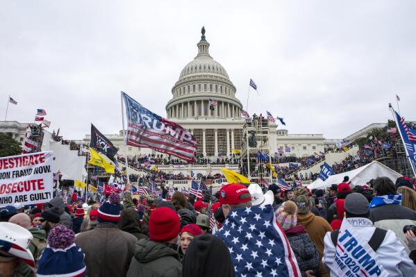 FILE - Rioters loyal to President Donald Trump rally at the U.S. Capitol in Washington on Jan. 6, 2021. (AP Photo/Jose Luis Magana, File)