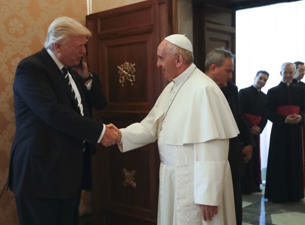 Pope Francis meets with President Donald Trump, left, on the occasion of their private audience, at the Vatican, May 24, 2017. (AP Photo/Alessandra Tarantino, Pool, File)