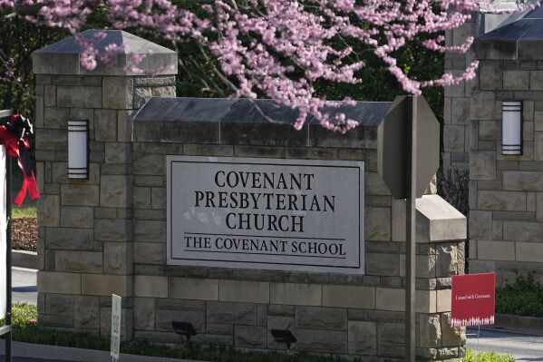 FILE - The entrance to the Covenant School is seen on the one-year anniversary of a mass shooting, March 27, 2024, in Nashville, Tenn. Family members representing the six people killed in a Nashville school shooting last year filed an ethics complaint Tuesday, April 9, against a Tennessee state senator. They claim a bill sponsored by Sen. Todd Gardenhire that would prevent people like them from intervening in public records disputes is self-serving. (AP Photo/George Walker IV, File)