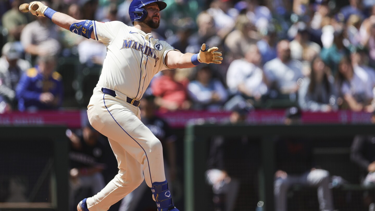 Mariners slugger Cal Raleigh leads MLB in homers and is on pace to set a season record for catchers
