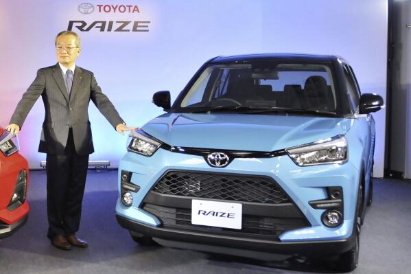 Toyota Raize hybrid vehicle produced by Daihatsu Motor Co. is unveiled in Tokyo on Nov. 5, 2019. Toyota has found improper crash tests for a model and suspended shipments, in the latest in a series of embarrassing woes plaguing Japan’s top automaker. (Kyodo News via AP)