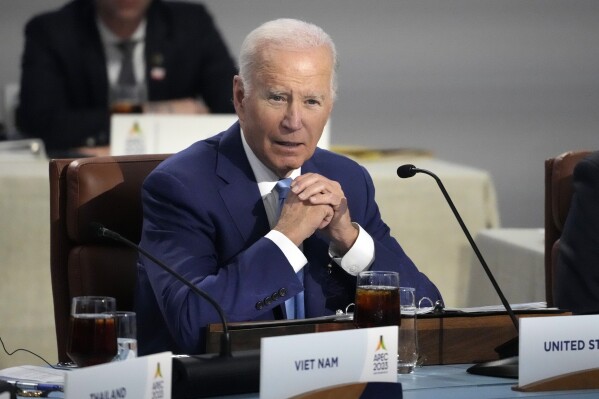 President Joe Biden speaks while sitting next to other leaders during the Asia-Pacific Economic Cooperation (APEC) conference, Thursday, Nov. 16, 2023, in San Francisco. (AP Photo/Jeff Chiu)