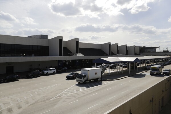 The exterior of the North terminal is seen at Hartsfield-Jackson Atlanta International Airport Thursday, March 10, 2016, in Atlanta. (AP Photo/David Goldman, file)