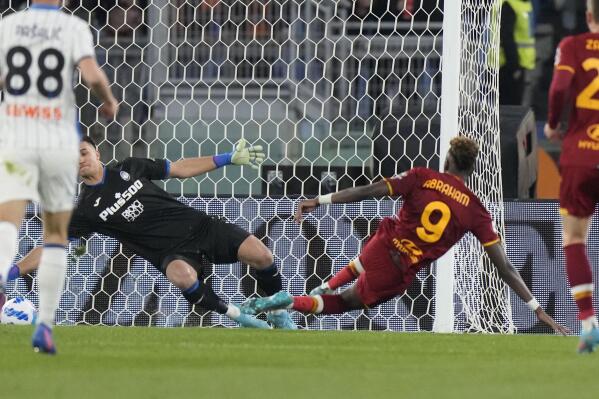 Roma's Tammy Abraham scores his side's first goal during a Serie A soccer match between Roma and Atalanta, at Rome's Olympic Stadium, Saturday, March 5, 2022. (AP Photo/Andrew Medichini)