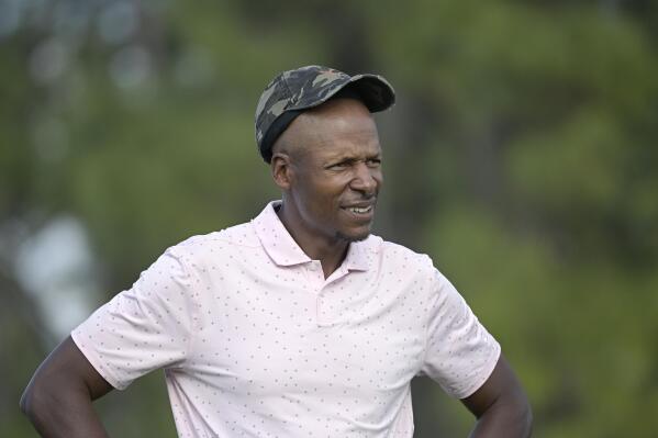 FILE - Former NBA basketball player Ray Allen waits to hit his tee shot on the 17th hole during the final round of the Tournament of Champions golf tournament, Sunday, Jan. 24, 2021, in Lake Buena Vista, Fla. Basketball Hall of Famer Ray Allen got scolded by a federal judge and ordered to donate $1,000 to charity for failing to show up at a trial after being selected as a juror. U.S. District Judge Marcia Cooke told Allen, 46, during Wednesday's, March 23, 2022, hearing that he had disrespected the court by skipping out on jury service. Her order says “no man or woman is above performing that civic duty.” (AP Photo/Phelan M. Ebenhack, File)