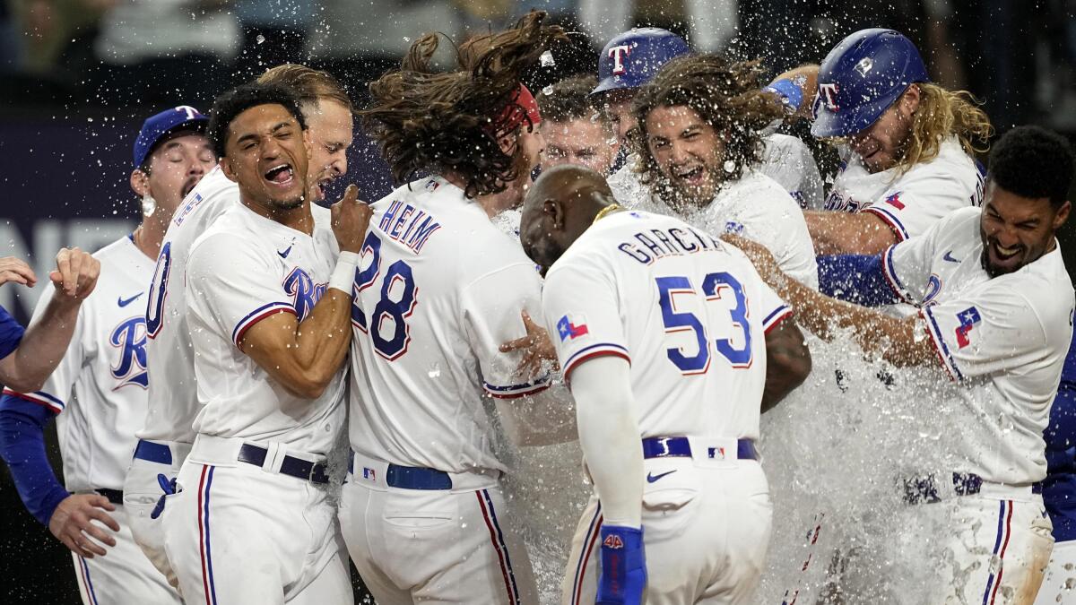 Heim HR in 10th gives Rangers win over KC after deGrom 9 Ks