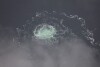 FILE - In this picture provided by Swedish Coast Guard, a leak from Nord Stream 2 is seen, on Sept. 28, 2022. Investigators found traces of subsea explosives in samples taken from a boat that has been one aspect of a probe into the sabotage of the Nord Stream gas pipelines under the Baltic Sea last year, European diplomats have told the U.N. Security Council. (Swedish Coast Guard via AP, File)