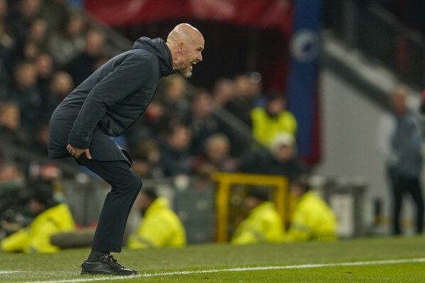 Manchester United's head coach Erik ten Hag gives instructions to his players during the Champions League group A soccer match between Manchester United and Copenhagen at the Old Trafford stadium in Manchester, England, Tuesday, Oct. 24, 2023. (AP Photo/Dave Thompson)