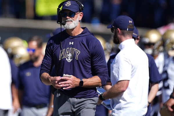 Navy head coach Brian Newberry in the first half of an NCAA college football game, Oct. 5, 2024, at Air Force Academy, Colo. (AP Photo/David Zalubowski File)