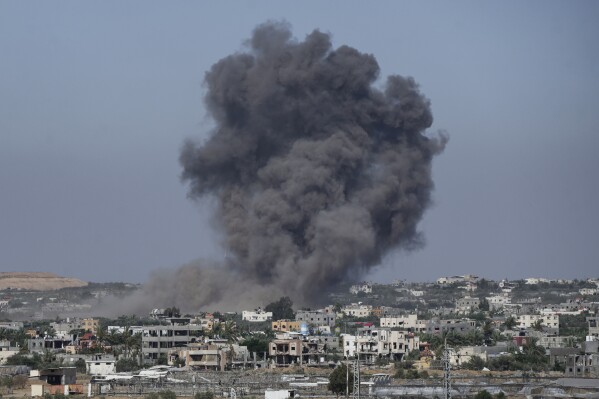 Smoke rises following an Israeli airstrike in Rafah, Gaza Strip, Thursday, May 30, 2024. (AP Photo/Abdel Kareem Hana)