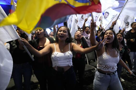 Supporters of Jan Topic, presidential candidate for the Country Without Fear Coalition, cheer during a campaign event ahead of snap elections set for Aug. 20, in Guayaquil, Ecuador, Thursday, Aug. 17, 2023. (AP Photo/Martin Mejia)