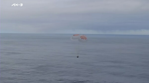 This photo provided by Axiom Space shows a SpaceX capsule parachuting into the Atlantic Ocean on Friday, Feb. 9, 2024 off the Florida coast. Astronauts from Turkey, Italy and Sweden returned to Earth on Friday, ending a private three-week mission to the International Space Station. (Axiom Space via 麻豆传媒app)