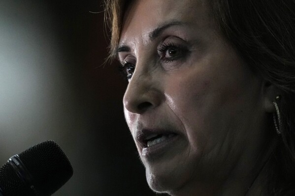 FILE - Peru's President Dina Boluarte talks to the press at the end of the Amazon Summit in Belem, Brazil, Aug. 8, 2023. (AP Photo/Eraldo Peres, File)