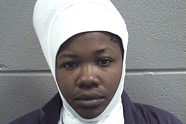 This undated booking photo released by the Cook County (Illinois) Sheriff's Office shows Sandra Kolalou. Kolalou was convicted Monday, April 22, 2024, of killing and dismembering her landlord and putting some of the victim’s remains inside a freezer in the boarding house where she lived. Her sentencing is scheduled for June 20. (Cook County Sheriff’s Office via Chicago Sun-Times via AP)