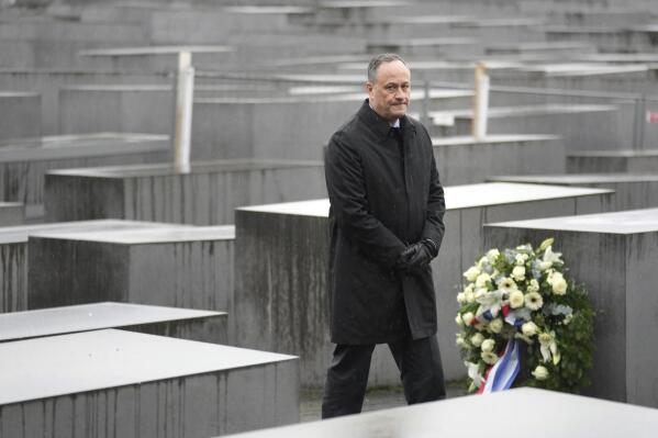 The Second Gentleman of the United States, Douglas Emhoff, stands between concrete steles after a wreath laying ceremony as part of his visit at the 'Memorial to the Murdered Jews of Europe' in Berlin, Germany, Tuesday, Jan. 31, 2023. (AP Photo/Michael Sohn, pool)