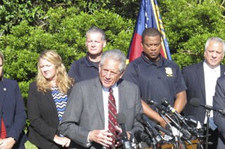 District Attorney Tom Durden of Georgia's Atlantic Judicial Circuit speaks at a news conference, May 8, 2020, in Brunswick, Georgia, about the killing of Ahmaud Arbery. Durden, the longtime prosecutor who won convictions in Georgia's infamous “tomato patch” killing and called in state investigators to build a case against the men who killed Ahmaud Arbery has died. Durden was 66. AP Photo/Russ Bynum)