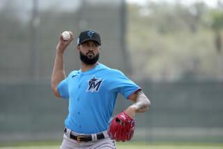 Sandy Alcantara of the Miami Marlins throws live batting practice