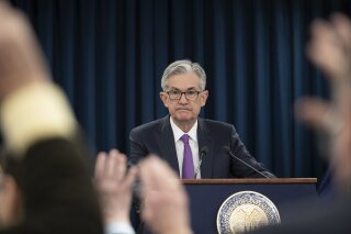 FILE - In this Jan. 30, 2019, file photo, Federal Reserve Chairman Jerome Powell waits for a question from a reporter at a news conference in Washington. Federal Reserve policymakers will meet for two days beginning Tuesday, Sept. 15, 2020, for the first time since they significantly revised the Fed’s operating framework in ways that will likely keep short-term interest rates near zero for years to come. (AP Photo/Alex Brandon, File)