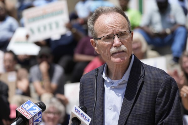 Pastor Jeff Parker of the Southside Baptist Church in Jackson, speaks in favor of "full" Mississippi Medicaid expansion, at a rally on the south steps of the Mississippi State Capitol in Jackson, Tuesday, April 16, 2024. (AP Photo/Rogelio V. Solis)