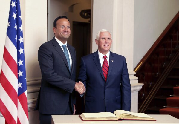 US Vice President Mike Pence is greeted by Irish Prime Minister Leo Varadkar during a visit to Farmleigh House, Dublin, Ireland, Tuesday, Sept. 3, 2019. The Vice President is currently in Ireland for a two day visit. (AP Photo/Peter Morrison)