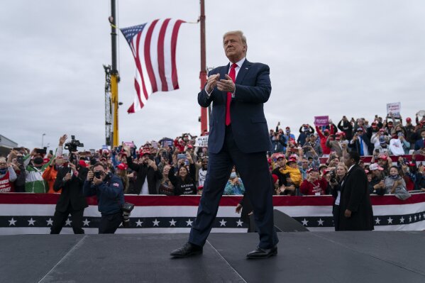 President Donald Trump arrives for a campaign rally at MBS International Airport, Thursday, Sept. 10, 2020, in Freeland, Mich. (AP Photo/Evan Vucci)