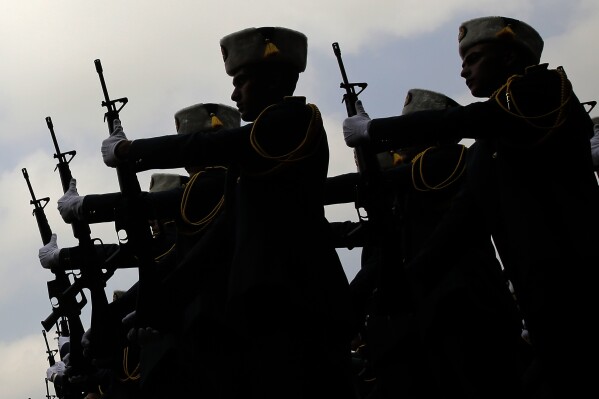 FILE - Lebanese officers parade during a graduation ceremony marking the 74th Army Day, at a military barracks in Beirut's suburb of Fayadiyeh, Lebanon, on Aug. 1, 2019. (AP Photo/Hassan Ammar)