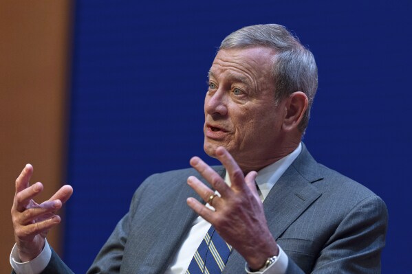 Chief Justice of the U.S. Supreme Court John Roberts speaks during a lecture to the Georgetown Law School graduating class of 2025, in Washington, May 12, 2025. (AP Photo/Manuel Balce Ceneta, File)