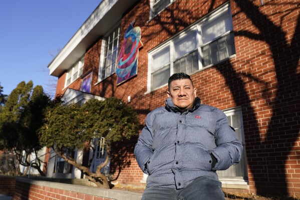 Jose Cruz Guzman, a resident of a United Renters for Justice apartment building, poses for a photo Monday, Dec. 18, 2023, in Minneapolis. (AP Photo/Abbie Parr)