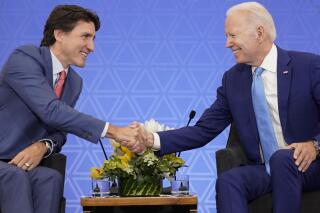 FILE - President Joe Biden meets with Canadian Prime Minister Justin Trudeau at the InterContinental Presidente Mexico City hotel in Mexico City, Jan. 10, 2023. Biden will visit Canada for the first time since taking office, the White House announced Thursday, March 9. The one-night trip will take place on March 23 and 24. (AP Photo/Andrew Harnik, File)