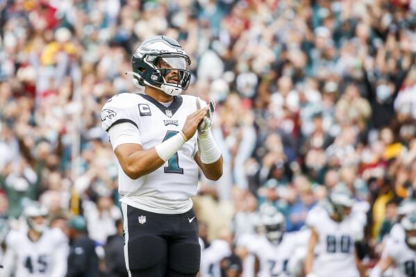 Philadelphia Eagles quarterback Jalen Hurts (1) celebrates after his team's first touchdown during the first half of a NFL football game between the Philadelphia Eagles and the Washington Football Team on Sunday, January 2, 2022 in Landover, Maryland.(Shaban Athuman/Richmond Times-Dispatch via AP)