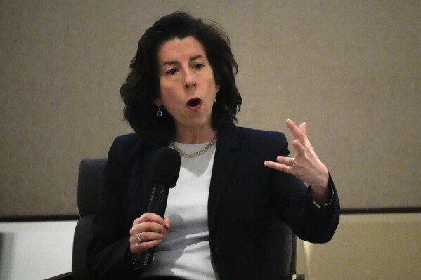 U.S. Commerce Secretary Gina Raimondo speaks to U.S. and Philippine business groups at Makati city, Philippines on Tuesday March 12, 2024. The United States is constantly assessing the need to expand export controls to stop China from acquiring advanced computer chips and manufacturing equipment that could be used to boost its military, Raimondo said Monday. (AP Photo/Aaron Favila)