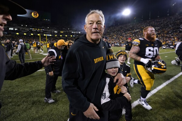 Iowa head coach Kirk Ferentz walks off the field after an NCAA college football game against Illinois, Saturday, Nov. 18, 2023, in Iowa City, Iowa. Iowa won 15-13. (AP Photo/Charlie Neibergall)