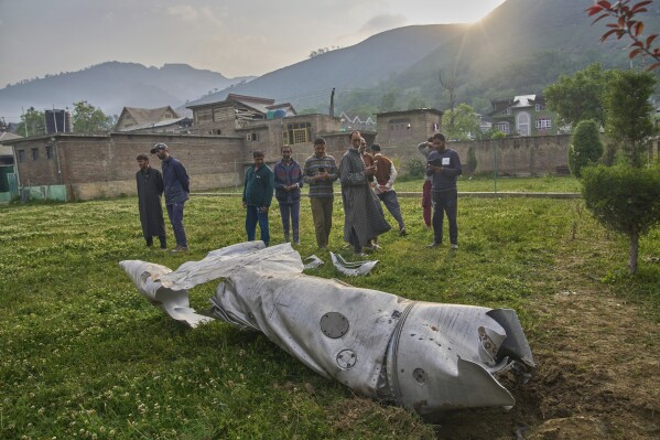 Debris of an aircraft lie in the compound of a mosque at Pampore in Pulwama district of Indian controlled Kashmir, Wednesday, May 7, 2025. (AP Photo/Dar Yasin)