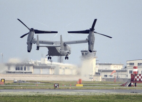 A U.S. military CV-22 Osprey takes off from Iwakuni base, Yamaguchi prefecture, western Japan, on July 4, 2018. A U.S. military Osprey aircraft carrying eight people crashed Wednesday, Nov. 29, 2023 into the sea off southern Japan, and the Japanese coast guard is heading to the site for search and rescue operations, officials said. (Kyodo News via AP)