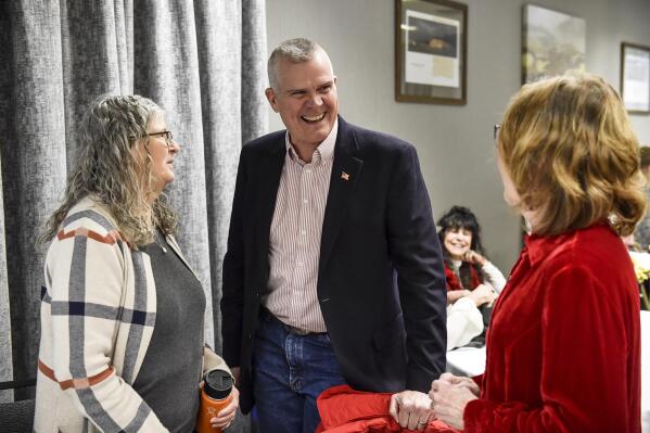 U.S. Rep. Matt Rosendale meets with supporters during a Lewis and Clark Republican Women's Club luncheon in Helena, Mont., on Friday, Nov. 4, 2022. (Thom Bridge/Independent Record via AP)