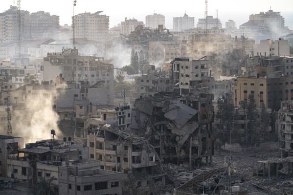 FILE - Destruction from Israeli aerial bombardment is seen in Gaza City, Wednesday, Oct. 11, 2023. The war between Israel and Hamas has brought carefully calibrated condemnations and warnings to both sides by Russia. (AP Photo/Fatima Shbair, File)