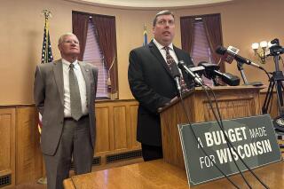 Wisconsin state Rep. Mark Born, right, and state Sen. Howard Marklein explain Republicans' decision to cut funding for state building projects requested by Gov. Tony Evers, during a news conference in the state Capitol, Thursday, June 1, 2023, in Madison, Wis. (AP Photo/Scott Bauer)