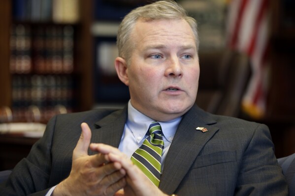 FILE - Arkansas Lt. Gov. Tim Griffin is interviewed in his office at the Arkansas state Capitol in Little Rock, Ark., Jan. 16, 2015. Several transgender, intersex and nonbinary Arkansas residents sued the state on Tuesday over its decision to no longer allow "X” to be listed instead of male or female and to make it more difficult to change the sex listed on state-issued driver’s licenses or identification cards. (AP Photo/Danny Johnston, File)
