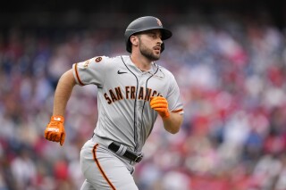 FILE - San Francisco Giants' Paul DeJong runs the baseline during a baseball game, Wednesday, Aug. 23, 2023, in Philadelphia. DeJong has agreed to a one-year contract with the Chicago White Sox, a person familiar with the agreement told The Associated Press. The person spoke on condition of anonymity Tuesday, Nov. 21, 2023, because the agreement was subject to a successful physical. (AP Photo/Matt Slocum, File)