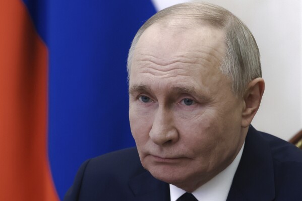 Putin likely to seek his own conditions after Ukraine signals openness to a  ceasefire | AP News